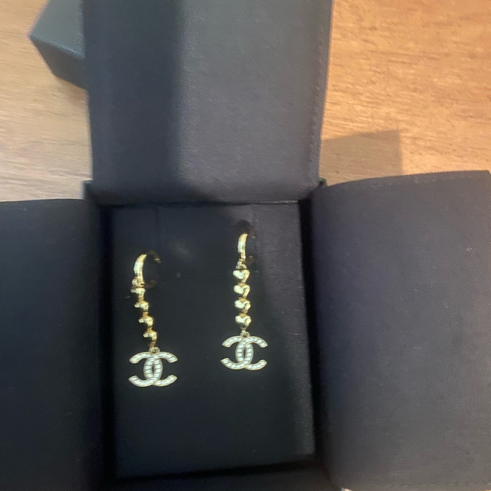 CHANEL Gold Logo Dangle Earrings